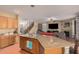 Kitchen island with double sink and granite countertops at 5389 S Scott Pl, Chandler, AZ 85249