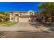 Two-story house with a three-car garage and landscaped front yard at 5389 S Scott Pl, Chandler, AZ 85249