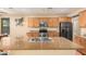 Kitchen with granite countertops and stainless steel appliances at 5389 S Scott Pl, Chandler, AZ 85249