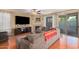 Spacious living room with a fireplace and sliding glass doors at 5389 S Scott Pl, Chandler, AZ 85249