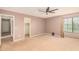 Spacious bedroom with neutral walls and ceiling fan at 5389 S Scott Pl, Chandler, AZ 85249