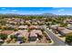 Aerial view of a residential neighborhood with mountain views at 4683 E Nightingale Ln, Gilbert, AZ 85298