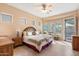 Bright main bedroom with backyard access and plenty of natural light at 7473 E Soaring Eagle Way, Scottsdale, AZ 85266