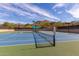 Two well-maintained tennis courts with scenic mountain views at 7473 E Soaring Eagle Way, Scottsdale, AZ 85266