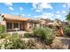 Landscaped backyard with patio and desert plants at 7473 E Soaring Eagle Way, Scottsdale, AZ 85266