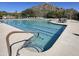 Community lap pool with separate spa and surrounding patio area at 7473 E Soaring Eagle Way, Scottsdale, AZ 85266