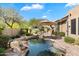 Private backyard pool with a stone border at 7473 E Soaring Eagle Way, Scottsdale, AZ 85266