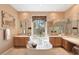 Large bathroom with a soaking tub, dual vanities, and a walk-in shower at 7473 E Soaring Eagle Way, Scottsdale, AZ 85266