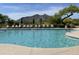Refreshing community pool area with plenty of lounge chairs and mountain views at 7473 E Soaring Eagle Way, Scottsdale, AZ 85266