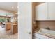 Convenient laundry room with a sink and cabinets at 7473 E Soaring Eagle Way, Scottsdale, AZ 85266