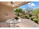 Covered patio with outdoor dining furniture at 7473 E Soaring Eagle Way, Scottsdale, AZ 85266