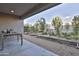 Landscaped backyard with garden, gazebo, and gravel pathway at 30346 W Columbus Ave, Buckeye, AZ 85396