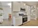 Well-equipped kitchen with ample cabinetry and granite countertops at 30346 W Columbus Ave, Buckeye, AZ 85396