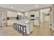 Modern kitchen with granite countertops and stainless steel appliances at 30346 W Columbus Ave, Buckeye, AZ 85396