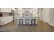 Spacious kitchen with island, stainless steel appliances, and granite countertops at 30346 W Columbus Ave, Buckeye, AZ 85396