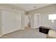 Bright bedroom with double door closet and access to bathroom at 30346 W Columbus Ave, Buckeye, AZ 85396