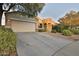 House exterior with driveway and landscaping at 30346 W Columbus Ave, Buckeye, AZ 85396