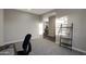 Spacious home office with view into adjacent living area at 30346 W Columbus Ave, Buckeye, AZ 85396