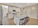 Modern kitchen with granite countertops and island at 30346 W Columbus Ave, Buckeye, AZ 85396