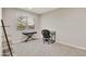 Home office with desk, chair, and shelving unit at 30346 W Columbus Ave, Buckeye, AZ 85396