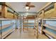 Unique bedroom with built-in bunk beds and ample storage at 30346 W Columbus Ave, Buckeye, AZ 85396
