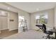 Bright home office features built-in shelving and wood-look flooring at 30346 W Columbus Ave, Buckeye, AZ 85396