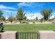 Scenic view of a lush green golf course from the property at 10224 E Michigan Ave, Sun Lakes, AZ 85248