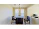 Charming dining area with a wood table and four chairs at 15409 W Corrine Dr, Surprise, AZ 85379