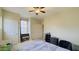 Bedroom with double bed, closet, and window at 15409 W Corrine Dr, Surprise, AZ 85379