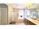 Double vanity bathroom with soaking tub and shower at 15409 W Corrine Dr, Surprise, AZ 85379