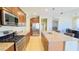 Modern kitchen featuring stainless steel appliances and ample counter space at 15409 W Corrine Dr, Surprise, AZ 85379