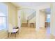 Open living area with natural light and staircase at 15409 W Corrine Dr, Surprise, AZ 85379