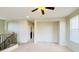Spacious loft area with neutral walls and carpeted floor at 15409 W Corrine Dr, Surprise, AZ 85379
