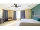 Large bedroom with ceiling fan and ample natural light at 15409 W Corrine Dr, Surprise, AZ 85379