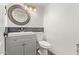 Modern gray vanity and updated fixtures in this bathroom at 2726 N Ricardo --, Mesa, AZ 85215