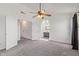 Spacious bedroom with ceiling fan and carpet flooring at 2726 N Ricardo --, Mesa, AZ 85215