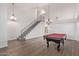 Pool table and staircase in a bright game room at 2726 N Ricardo --, Mesa, AZ 85215
