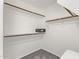 Walk-in closet with ample shelving and a safe at 2726 N Ricardo --, Mesa, AZ 85215