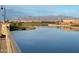 Scenic lake view with mountain backdrop at 22427 E Oriole Way, Queen Creek, AZ 85142