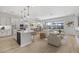 Open floor plan with kitchen, living, and dining areas at 22427 E Oriole Way, Queen Creek, AZ 85142