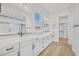 Elegant bathroom with double vanity, large mirror, and walk-in shower at 22427 E Oriole Way, Queen Creek, AZ 85142