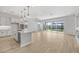 Open living space with tile floors and sliding doors to backyard at 22427 E Oriole Way, Queen Creek, AZ 85142