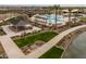 Resort-style pool with expansive sundeck and shaded seating areas at 22427 E Oriole Way, Queen Creek, AZ 85142