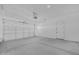Spacious two-car garage with concrete floor and automatic opener at 22427 E Oriole Way, Queen Creek, AZ 85142