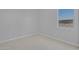 Simple bedroom with carpeted floors and a window with natural light at 22427 E Oriole Way, Queen Creek, AZ 85142