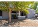 Exterior view of a condo unit with a tree at 4820 N 89Th Ave # 100, Phoenix, AZ 85037