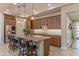 Gourmet kitchen with granite countertops and modern cabinetry at 16917 W Sheridan St, Goodyear, AZ 85395