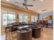 Spacious living room featuring a comfortable seating area and large windows at 16917 W Sheridan St, Goodyear, AZ 85395