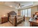 Bright bedroom with a king-size bed and plenty of natural light at 16917 W Sheridan St, Goodyear, AZ 85395