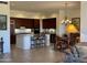 Open kitchen with island, breakfast area, and lots of cabinet space at 22455 N 55Th St, Phoenix, AZ 85054